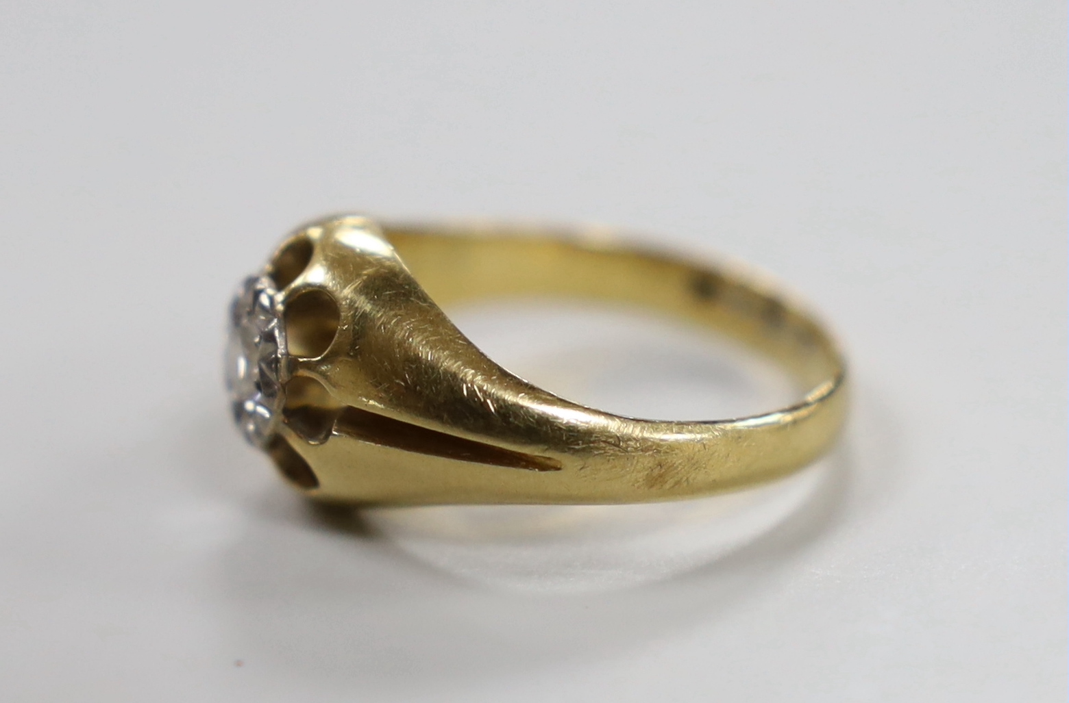 An 18ct illusion and claw set solitaire diamond ring, size Q/R, gross weight 8 grams.
